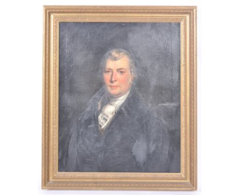 An early 19th Century Georgian oil on canvas portrait painting depicting an aristocratic gentleman wearing black overcoat wit