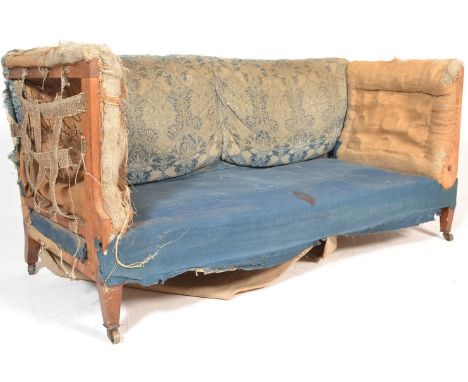 Howard &amp; Sons - Am original 19th Century Victorian drop arm sofa settee having a drop arm mechanism to side with cushione