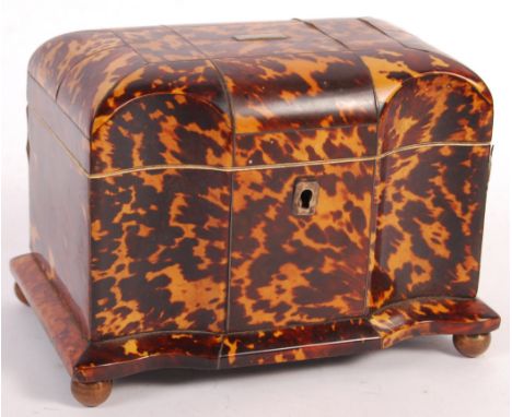 A beautiful late 18th century Georgian blonde tortoiseshell serpentine dual-compartment tea caddy. The serpentine shaped fron