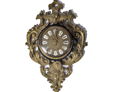 A 19th century gilt metal wall clock of French origin. The&nbsp; gilt engine turned face with vignette panel chapter ring set