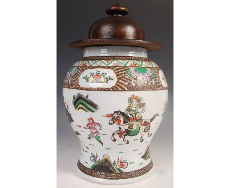 A 19th Century Chinese porcelain temple jar of bulbous form having crackle glaze white enamel ground with hand painted famill