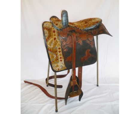 AN AMERICAN SIDE SADDLE, full head, carpet seat and safe, roller bar, stirrup and girth, highly decorative 