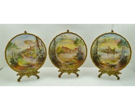 THREE ROYAL DOULTON HAND-PAINTED CHINA PLATES "Shakespeare's Country" signed by Charles Hart, circa 1922, with gilt rims, inc