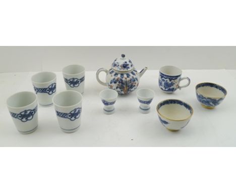 A 19TH CENTURY JAPANESE PORCELAIN TEAPOT OR SAKI POT of lobed gourd form, cobalt blue and iron red painted decoration, togeth