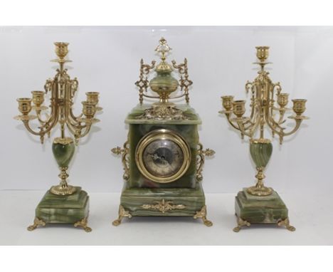 A LATE 20TH CENTURY DECORATIVE CLOCK GARNITURE SET comprising; a French design onyx and gilt metal mantel clock, 45cm high, f