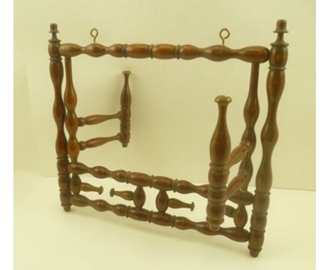 A 19TH CENTURY TREEN WIG STAND, various bobbin turned articulated arms on a frame, 34cm x 36cm 