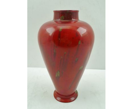 A HOWSON RED FLAMBE GLAZED CERAMIC VASE of baluster form, the base marked "Howson" (W. Howson Taylor - Ruskin connection) mon