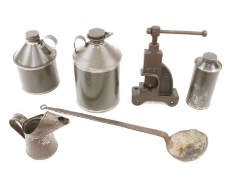 Four oil tins, a ladle and a RECORD No 31 pipe vice G 