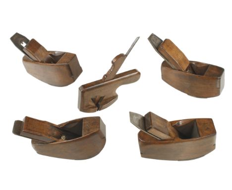 A set of 4 small coachmaker's compass smoothers with steel soles and a pretty radiused and compassed T rebate G 