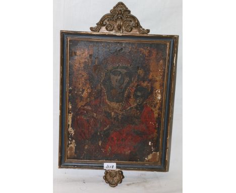 18th century or earlier Madonna and Child, oil on panel, within a decorative frame, 31cm x 24cm CONDITION REPORT: Panel, boar