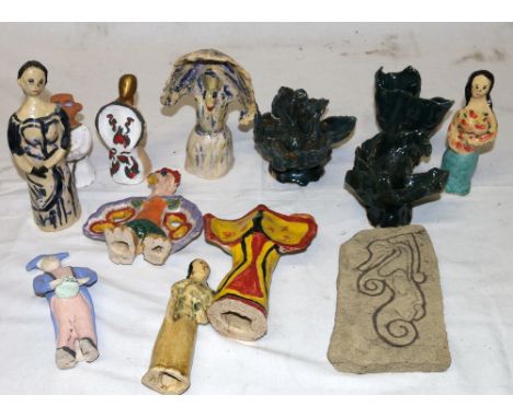 Group of twelve modern ceramic figures etc, and a Celtic stone carving by A.K. McFetters