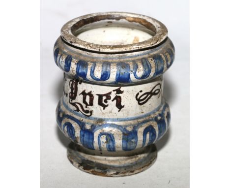 Italian Albarello decorated in blue glaze on white with central inscription CONDITION REPORT: As a whole, rather dirty
Rim ap