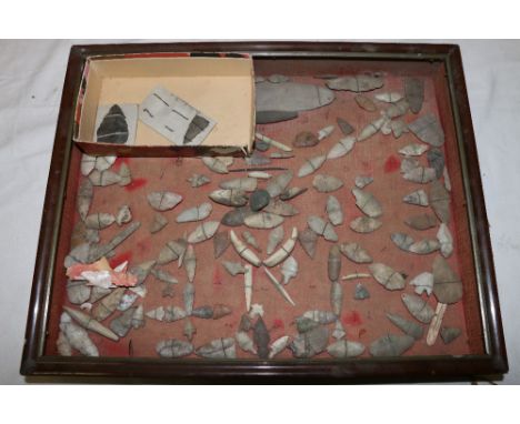 Large collection of arrowheads and tools including a skinning knife