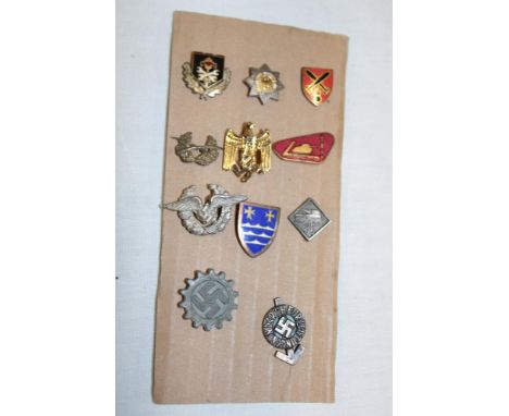 A selection of various German Second War miniature stick-pins and lapel badges