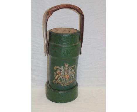 A First War canvas covered  cylindrical ammunition shell holder with coat of arms decoration and leather handle, 13" high