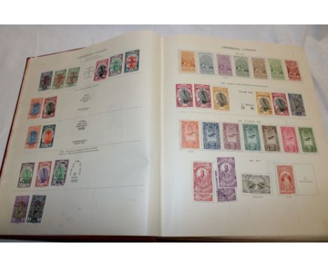 An album containing a collection of World stamps A-J up to the 1930's including over-prints and 19th century examples