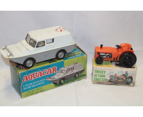 A Marks "Tricky Action Tractor" in original box and a battery operated "Aquacar" in original box (2)