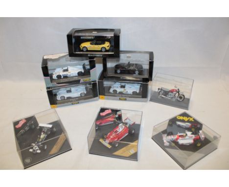 Three Onyx mint and boxed Formula 1 racing cars, three mint and boxed Onyx racing cars including Le Mans BMW and BMW test car