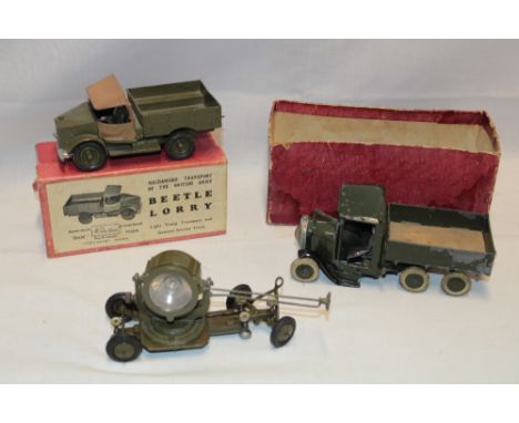 A Britains Ltd "Beetle Lorry" in original box; Britains Military truck in part box (af) and a Britains Army search light (3)