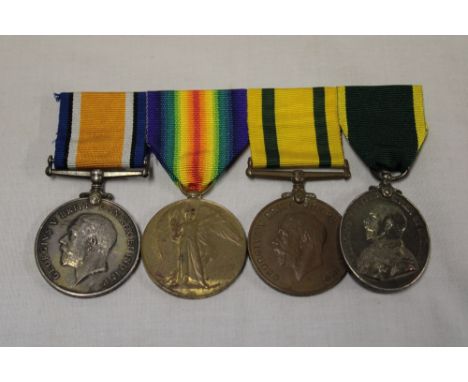 A group of four medals awarded to Sjt. S. Mugford DCLI/Devon Regiment:-  British War and Victory medals (No. 29179 Sjt. DCLI)