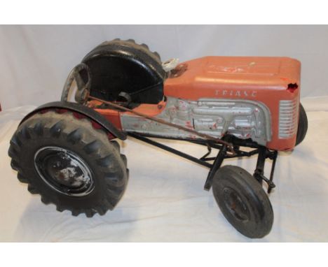A Triang child's pedal tractor requiring restoration