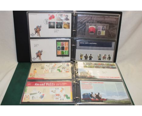 Two folder albums containing approximately 80 various presentation packs and first day covers 1990's-2000's