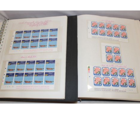 Two folder albums containing a collection of New Zealand mainly mint stamps 1970's/80's including definitive stamps, blocks, 
