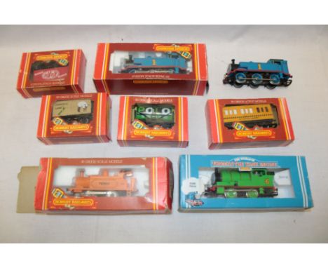 A selection of Hornby Thomas the Tank Engine locomotives including three various boxed locomotives, boxed goods wagon etc.