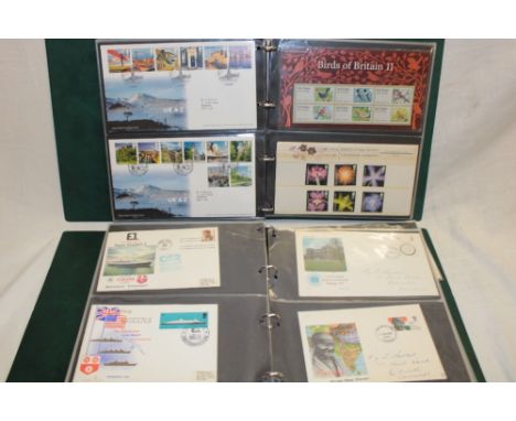 Two folder albums containing a selection of mixed first day covers and stamp presentation packs, 1970's onwards