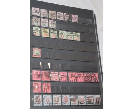 An album containing a collection of GB Victorian stamps including numerous over-prints "IR Official", "Government Parcels", "