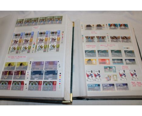 Two albums containing a large collection of GB EIIR mint stamps, mainly 1960's-1980's including blocks, strips, controls, par