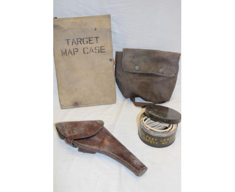 A First War Officer's brown leather revolver holster, tin of safety fuse lengths, target map case and an instructions and dia