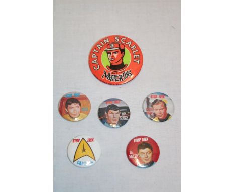 A vintage Lone Star Captain Scarlet badge and five Kellogg's Star Trek badges