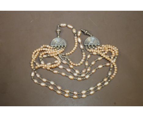 A STERLING SILVER AND PEARL NECKLACE STAMPED 925