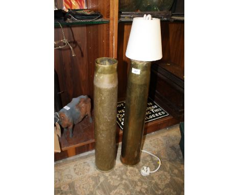 A LARGE TRENCH ART LAMP AND A LARGE EMPTY SHELL