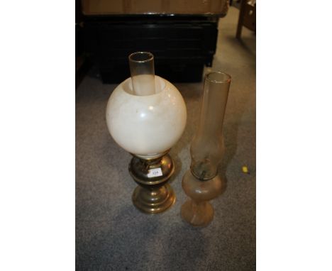 A VINTAGE OIL LAMP WITH DUPLEX BURNER, PLUS ANOTHER
