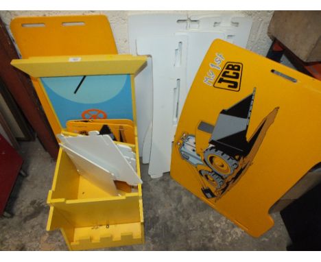 A CHILDS JCB YELLOW BED AND TRACTOR CHAIR