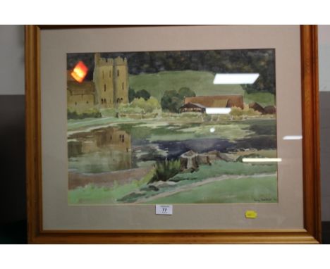 A FRAMED AND GLAZED SIGNED RUBY BOSTOCK WATERCOLOUR DEPICTING A LAKE BY A CHURCH 