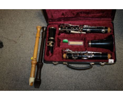 A CASED BLESSING CLARINET TOGETHER WITH TWO RECORDERS (3)