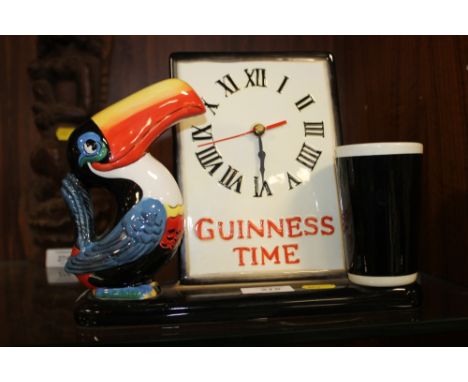 A CERAMIC GUINNESS TIME PELICAN CLOCK