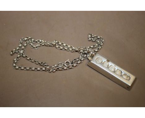 A HALLMARKED SILVER INGOT ON CHAIN 