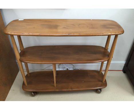 An Ercol magazine table