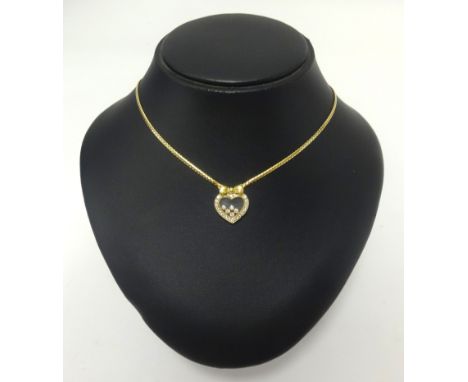 Chopard, an 18ct Happy Diamonds necklace, inset with 'floating' diamonds, on a fine gold chain.