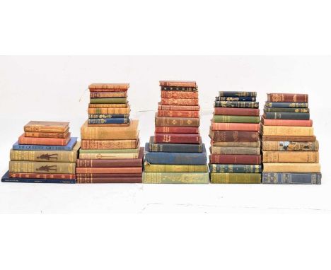 Collection of approximately sixty 19th and early 20th century books, many first editions, bound mostly in cloth and some in l