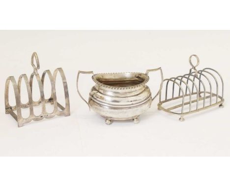 Edward VII and George V silver toast racks, London 1901 and Sheffield 1932, and a George V silver sugar basin, Sheffield 1928