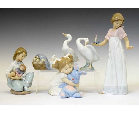 Lladro - Four boxed porcelain figures comprising; Duckling (04895), 2x Little Duck (04553 and 2) and Thoughtful Caress (05990