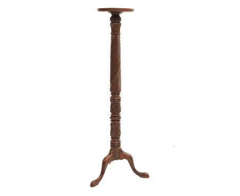 Early 20th century mahogany torchère, having a carved twisted pedestal raised on a tripod base, 31cm diameter x 146.5cm high 