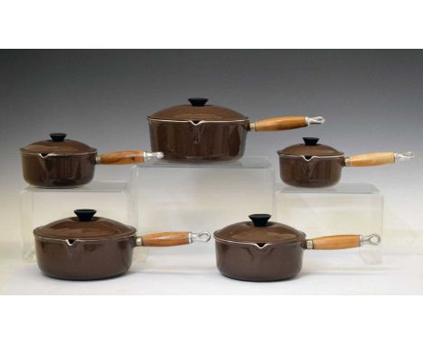 Le Creuset - Graduated set of five brown enamel saucepans with lids, 22cm diameter x 9cm high and smaller (5)