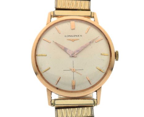 Longines - Gentleman's yellow metal cased wristwatch, having a silvered dial with applied gilt baton hour markers, seconds su