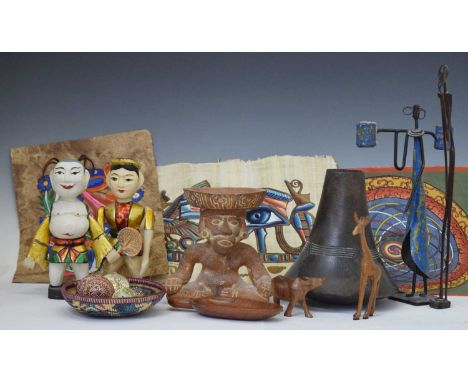 Group of ethnographica, to include Bhutan carvings, drawings, pottery figure, wicker vessels, etc., 20cm high and smaller